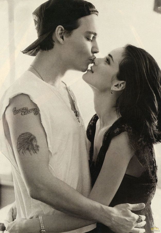 Johnny Depp Winona Forever tattoo on right arm near to shoulder