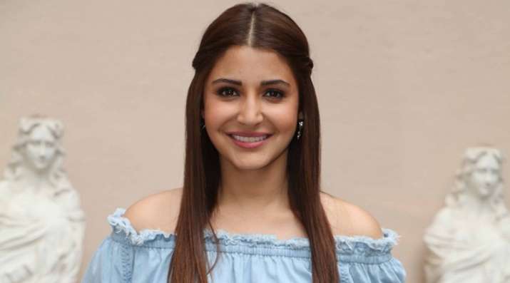 Anushka Sharma - Rolled hair tied back with middle partition