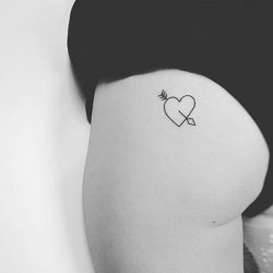 24 Sexy Butt Tattoos - butt tattoo heart with an arrow