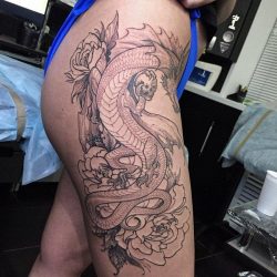 24 Sexy Butt Tattoos -elongated dragon tattoo on butt