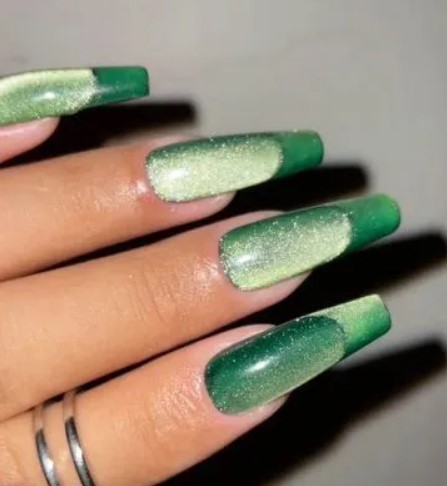 Green shaded cat eye nail art