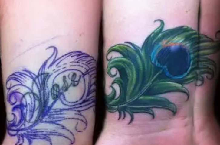 Peacock Feather Hand Coverup Tattoo